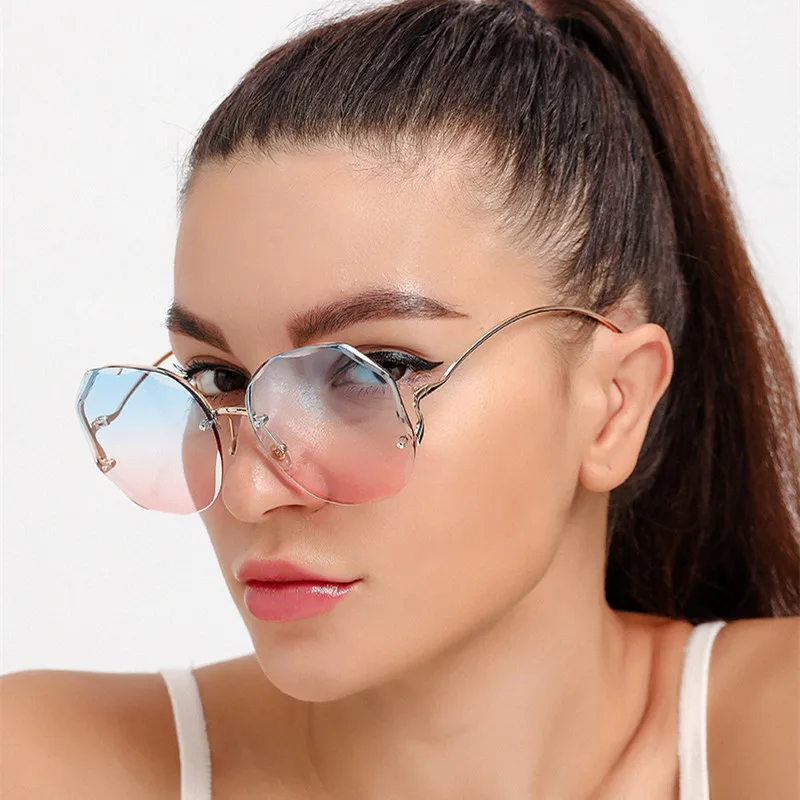 שיפוע משקפי שמש לנשים סיבוב מתכת מעוקל משקפיים מסגרות UV400 משקפי האוקיינוס ללא שפה אופנה משקפי שמש